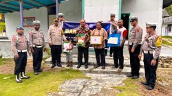 HUT Lantas ke 69, Satlantas Polres Supiori Bagikan 100 Paket Bansos untuk Warga